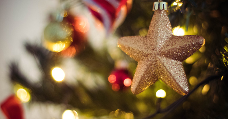 Close up of Christmas decorations on tree.