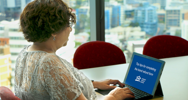 Woman watching a video on a laptop computer
