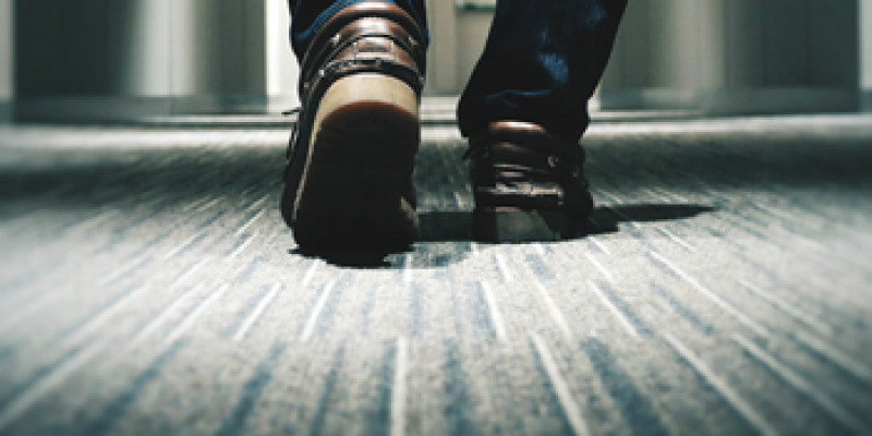 Person walking on carpet