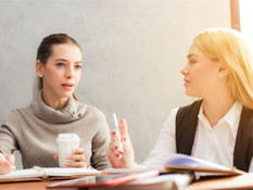 Two women in a discussion