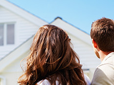 Couple looking at house